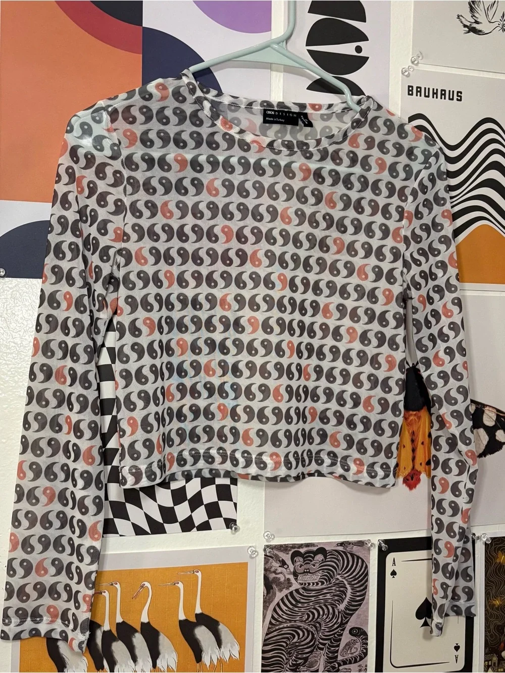 ASOS DESIGN Yin‑Yang Mesh Long Sleeve Crop Top